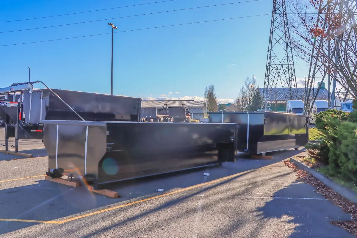 Roll-off dumpster ready for waste disposal at job site for Commercial Dumpster Rental in DeWitt